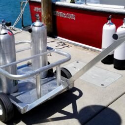 Two oxygen tanks sitting in the all aluminum Scuba Niner, on the pier from Kahuna Wagons.