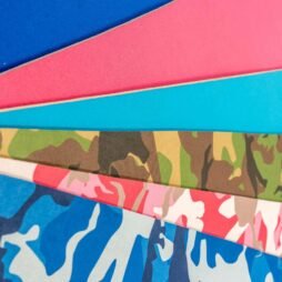 8mm neoprene padded deck mats in royal blue, solid pink, green camo, pink camo, and blue camo colors, spread out.